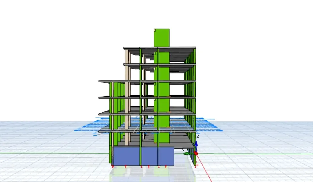 Modèle structurel d'un bâtiment industriel en béton armé avec noyaux verts et sous-sol bleu