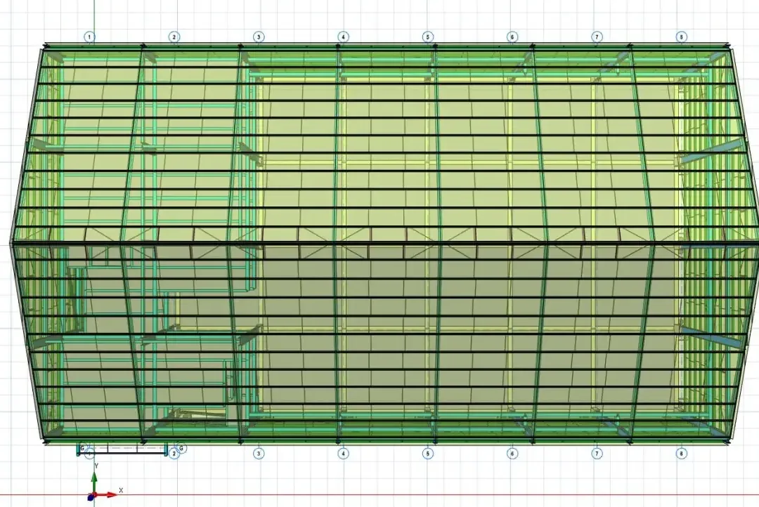 Vue en plan d'un bâtiment de laboratoire métallique montrant l'ossature de toiture et la trame de poteaux intérieure