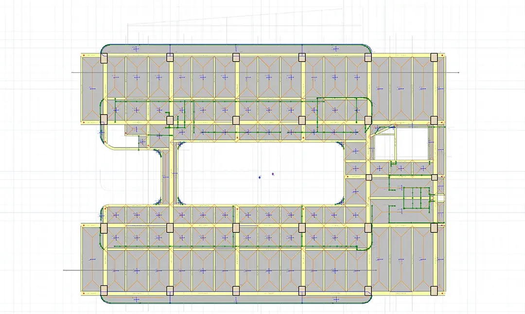 Merkezi bir avlu boşluğu etrafında düzenlenen enstitü binasının taşıyıcı kat planı